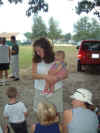 02-08-03-1_012_Pam_holding_Abigal_and_kids.jpg (117626 bytes)