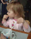 03-04-24_004_Megan_eating.jpg (100731 bytes)