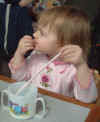 03-04-24_006_Megan_w_straw_eating.jpg (102077 bytes)