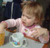 03-04-24_008_Megan_w_hand_in_fries.jpg (130795 bytes)