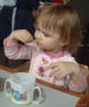 03-04-24_010_Megan_eating_fries.jpg (103398 bytes)