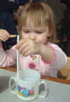 03-04-24_016_Megan_w_straw_and_fry.jpg (89403 bytes)