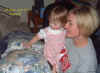 03-04-27_016_Megan_pets_the_lizard.jpg (133485 bytes)