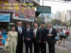 Captioned_Taking_Care_of_Business_in_Hong_Kong_6-99_8x10.jpg (118687 bytes)